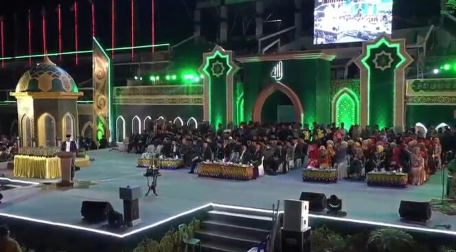 
					Sekda Aceh, Taqwallah Saat Menyampaikan Pidato Gubernur Aceh Nova Iriansyah Pada Penutupan MTQ ke XXXV Aceh di Bener Meriah, Jumat (24/6/2022) Malam
